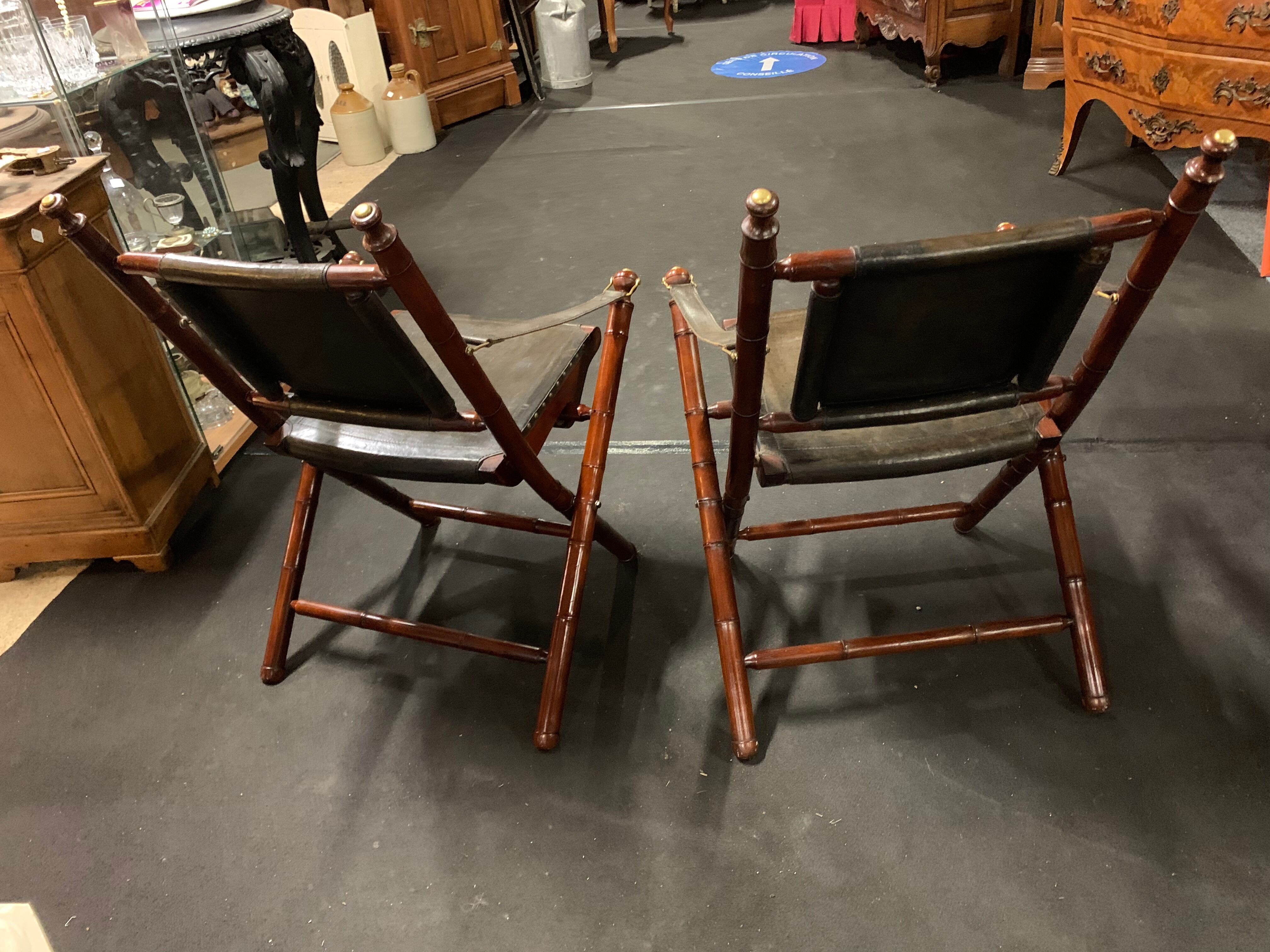Pair of mahogany colonial armchairs