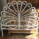 Rattan headboard & white wicker peacock tail décor 50-60s