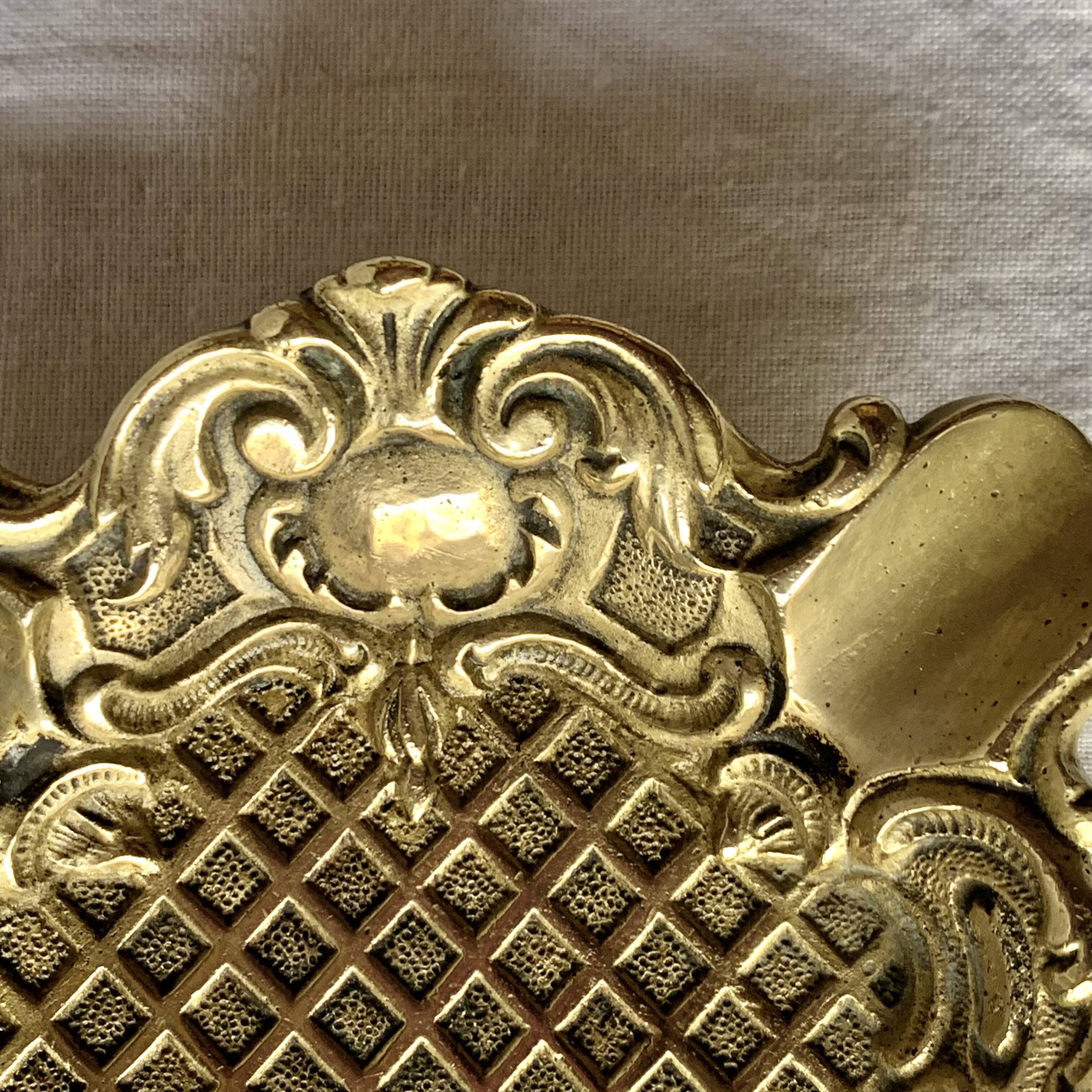 Neo-Baroque brass ashtray stamped DL number 6 registered