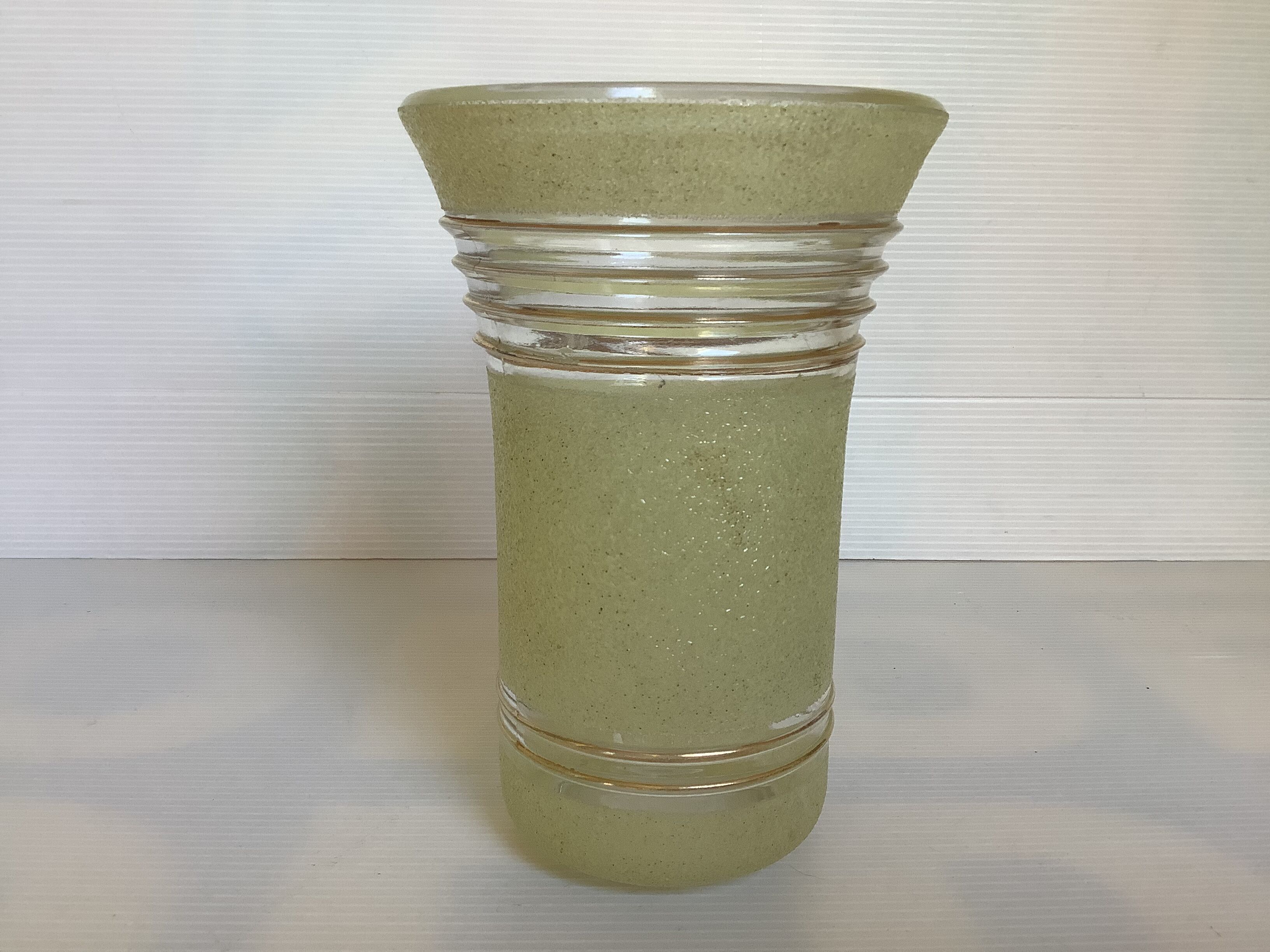 Old yellow frosted glass vase