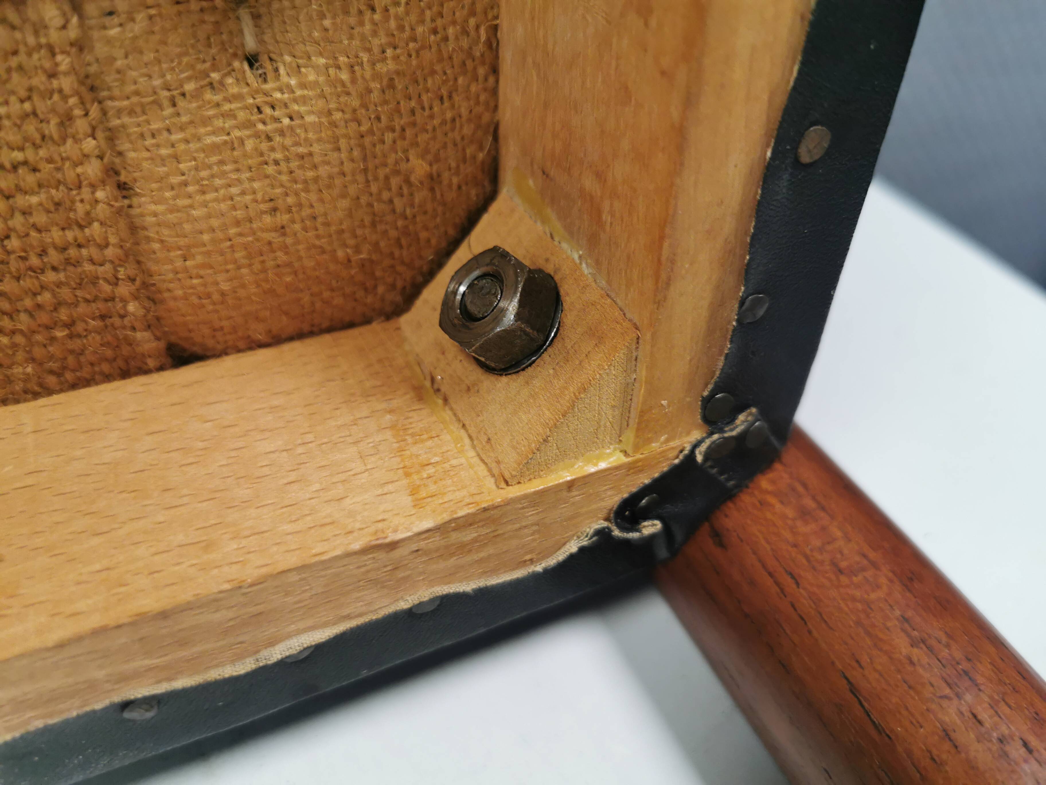 Footstool with teak wood legs and black skai (imitation leather) 1970s