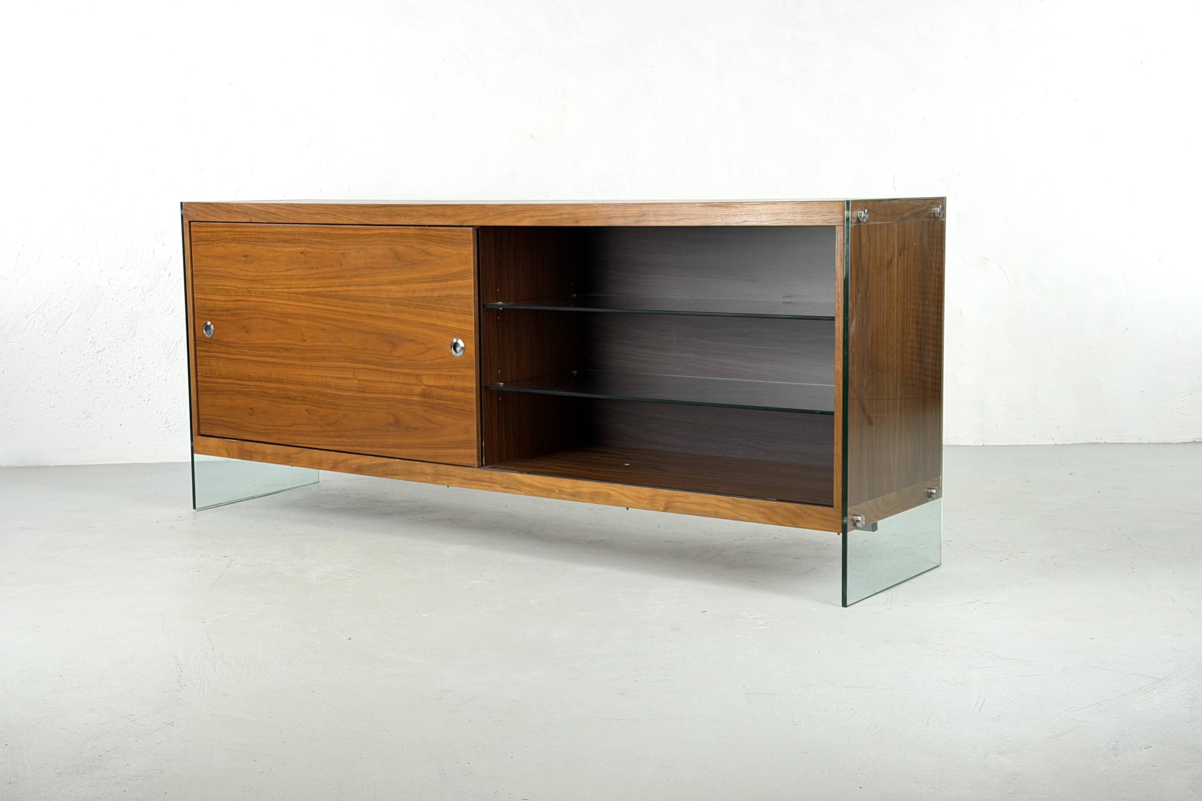 Teak sideboard with glass legs, France - 1990s