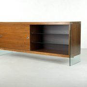 Teak sideboard with glass legs, France - 1990s