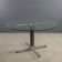 Vintage round table in chrome metal and glass, 1970s.