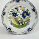 Delftware plate in white and blue with floral decoration, 18th century, Ø 36.5 cm