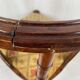 Fauteuil de coin à dossier lyre, vers 1900