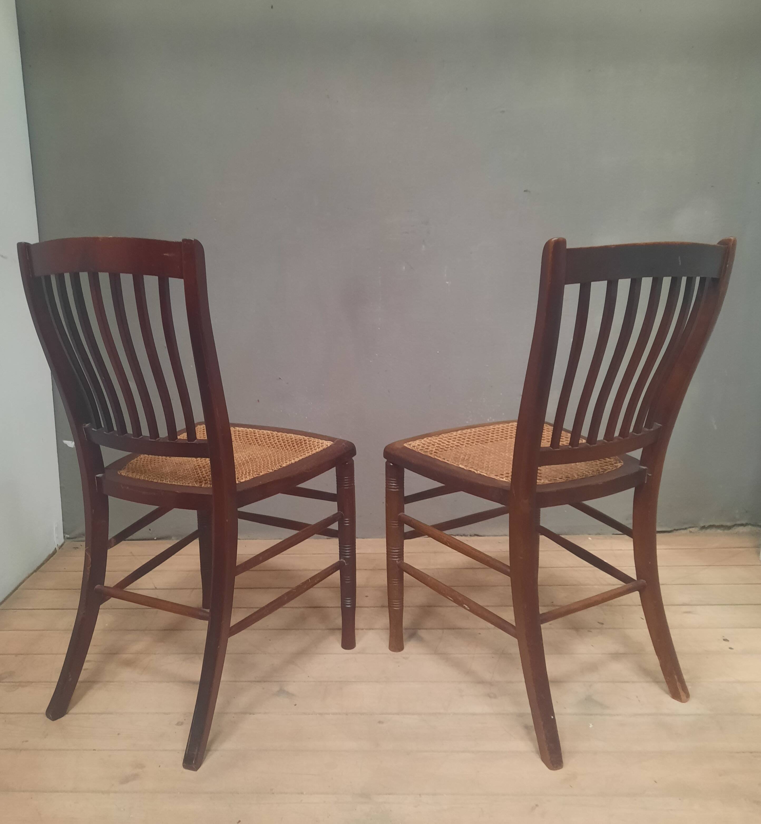 Pair of "1900" caned chairs