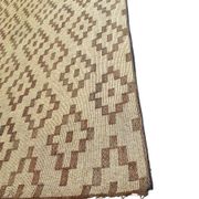 Vintage Touareg mat made of leather and reeds.