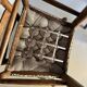 Rustic ladder-back oak chairs with embroidered seats | Netherlands | 1950s