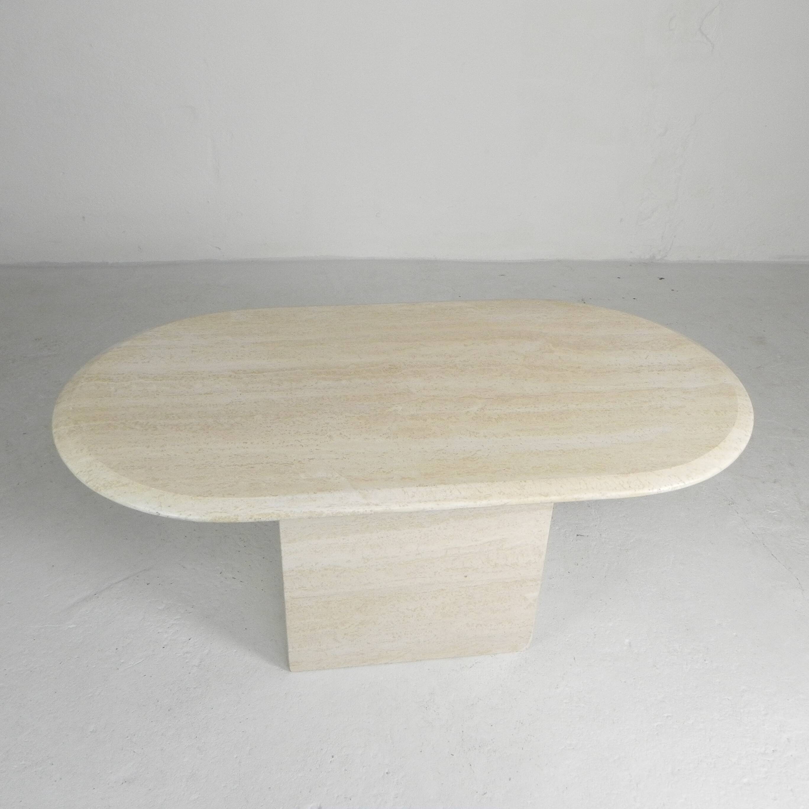 Mid-Century travertine coffee table with an oval top, 1970s.