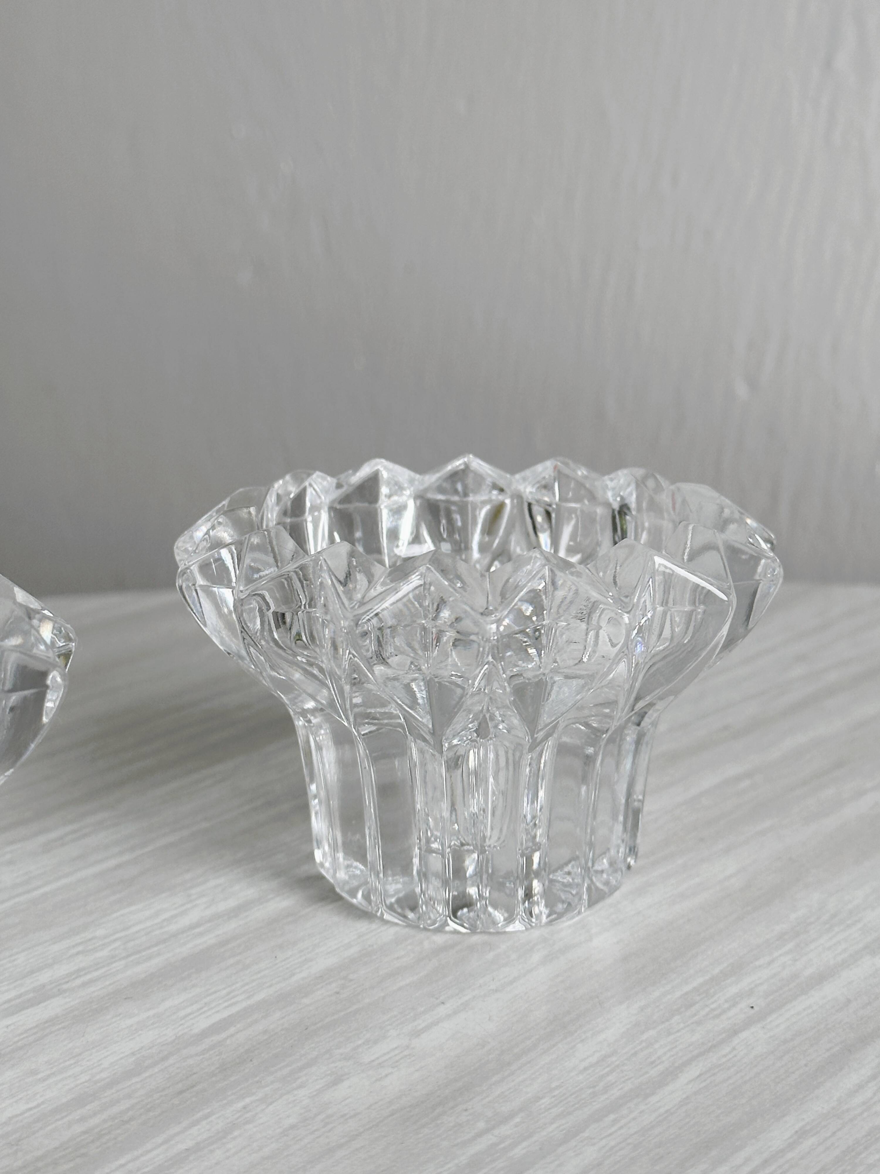 Elegant pair of faceted cut crystal candlesticks