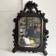 Napoleon III mirror in carved blackened wood, 19th century