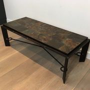 Rare coffee table in steel and wrought iron with a top made of lava stones