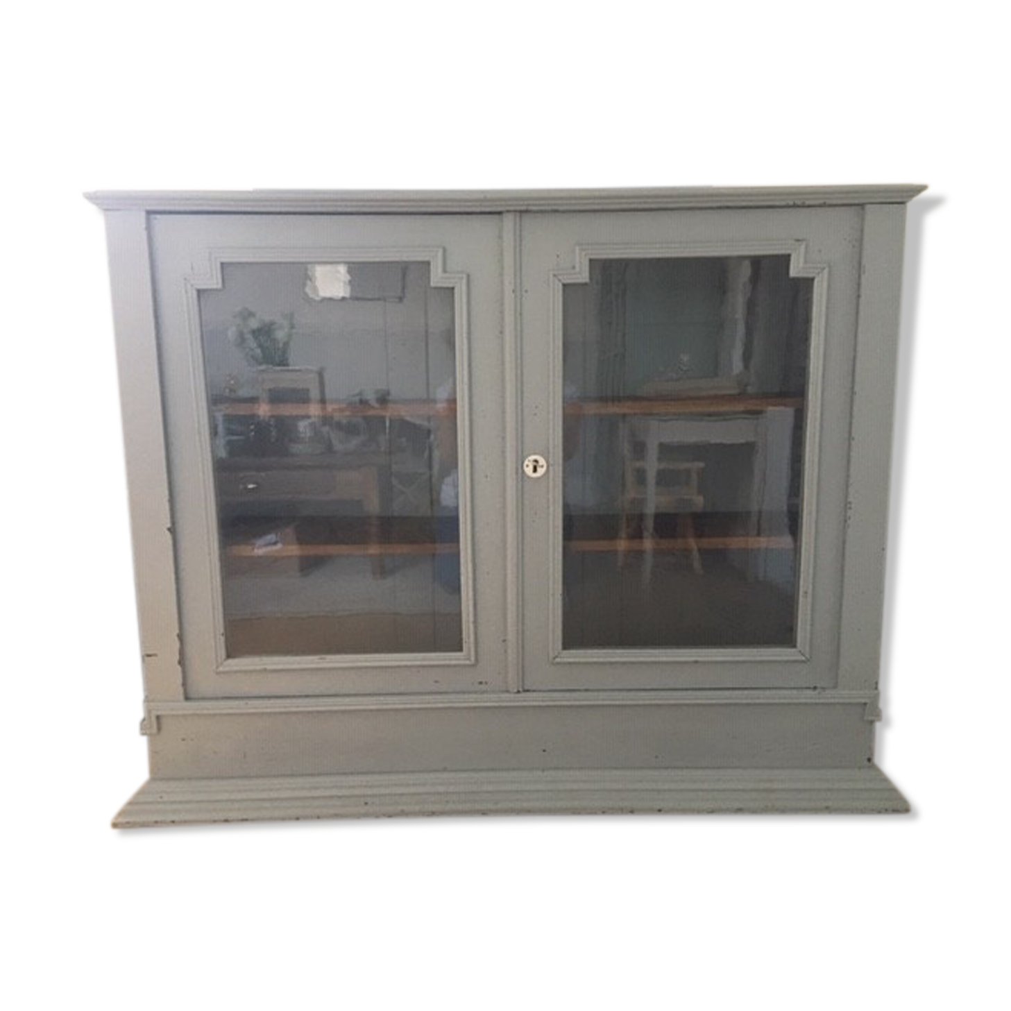 Vintage wooden cupboard and porcelain lock