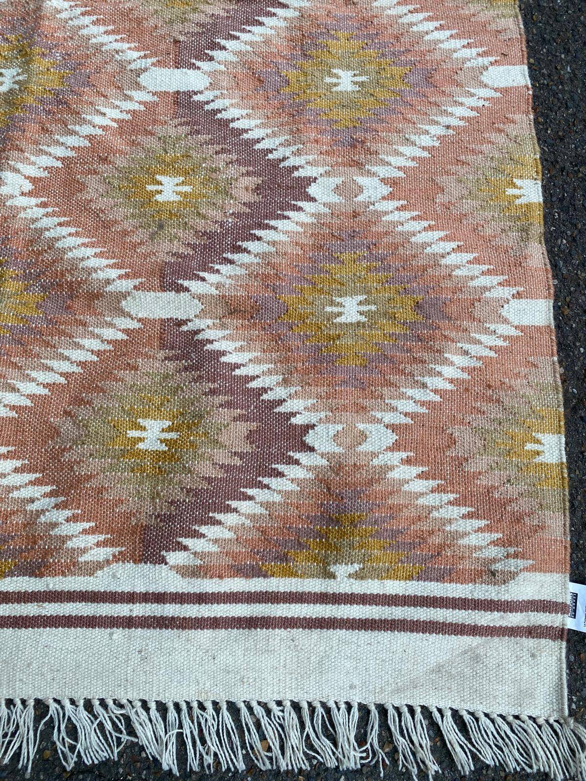 Tapis tissé laine et jute multicolore 140x200