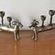 Pair of religious silver-plated zoomorphic candlesticks