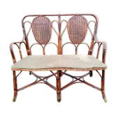 Bench 50 years in rattan