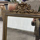 Large antique gilt mirror with scroll and shell decoration, 144 cm