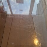 Vintage deco nesting table in smoke plexiglas 1970