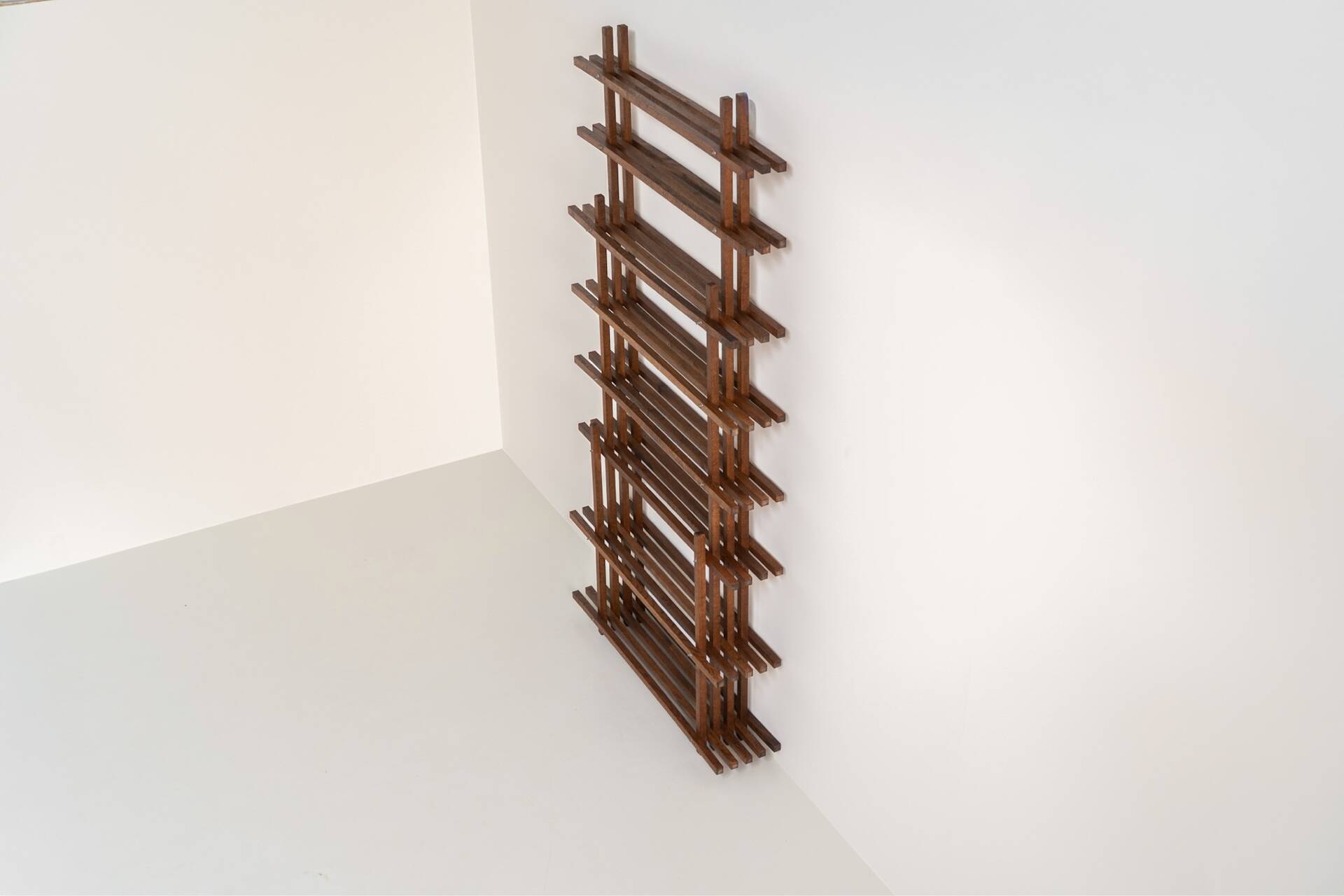 Sculptural wengé slat bookcase (Europe, 1960s).