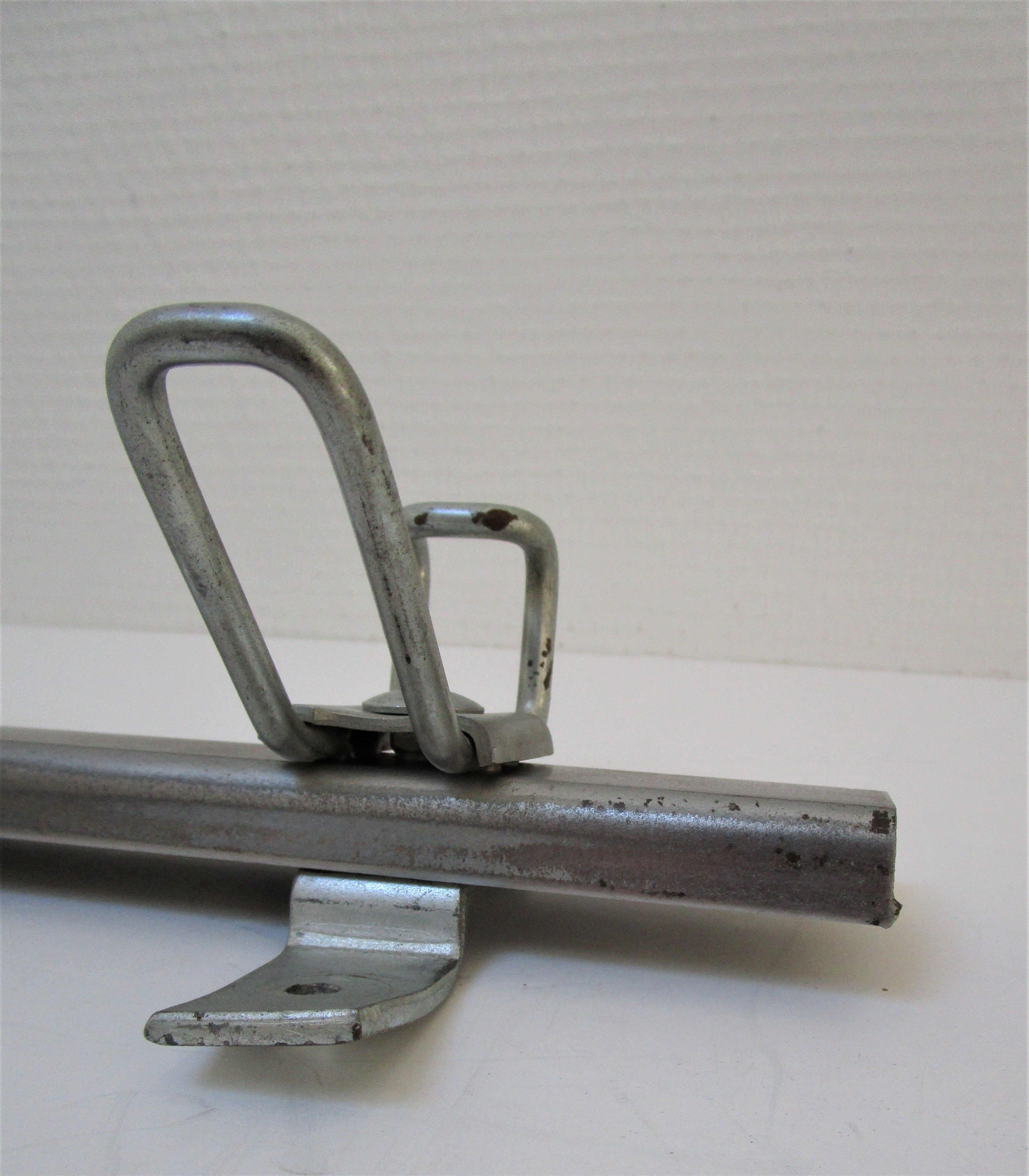 Vintage school wall rack in patinated steel