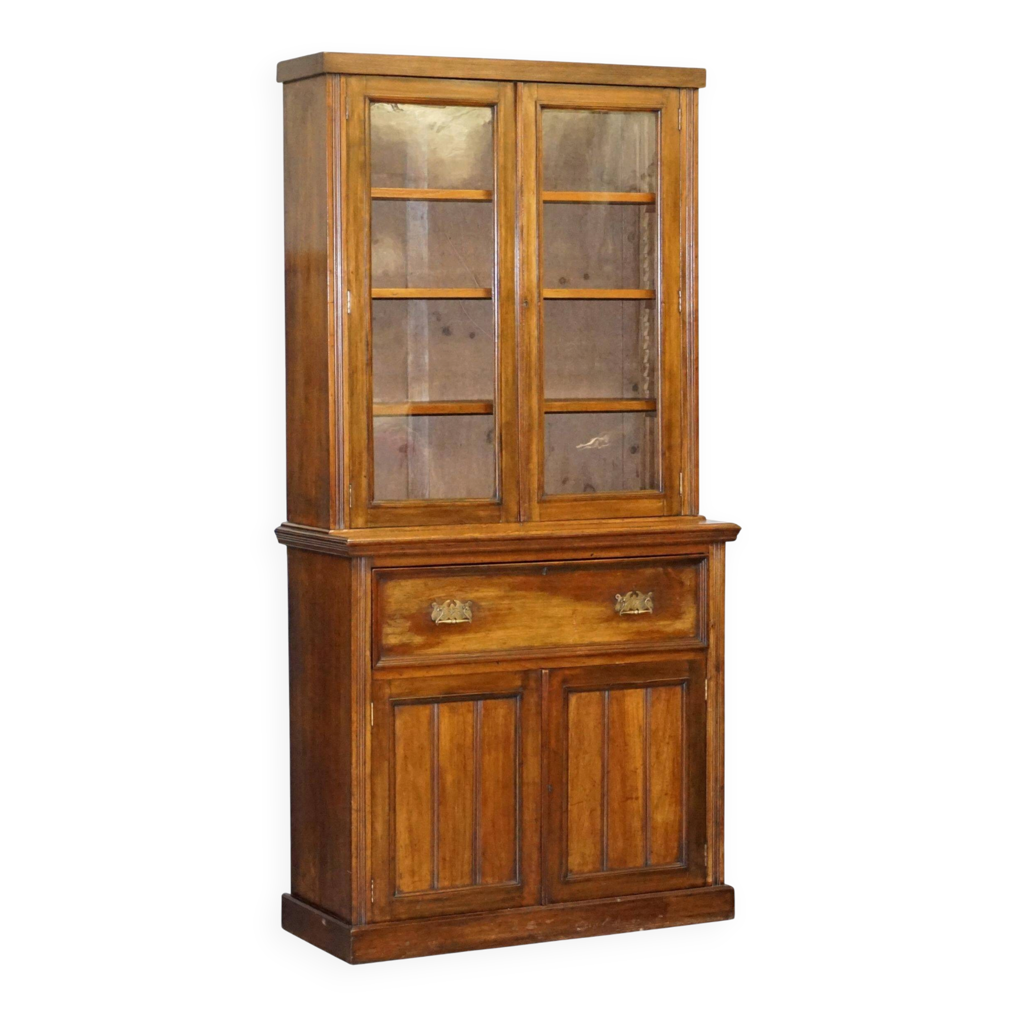 Light wood library with a secretary and leather surface.