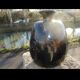 Vase in multi-layered black glass paste with inclusions of gold and other colors, signed by Bob le Bleïs