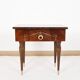 Vintage bedside table from the 70s in varnished wood.