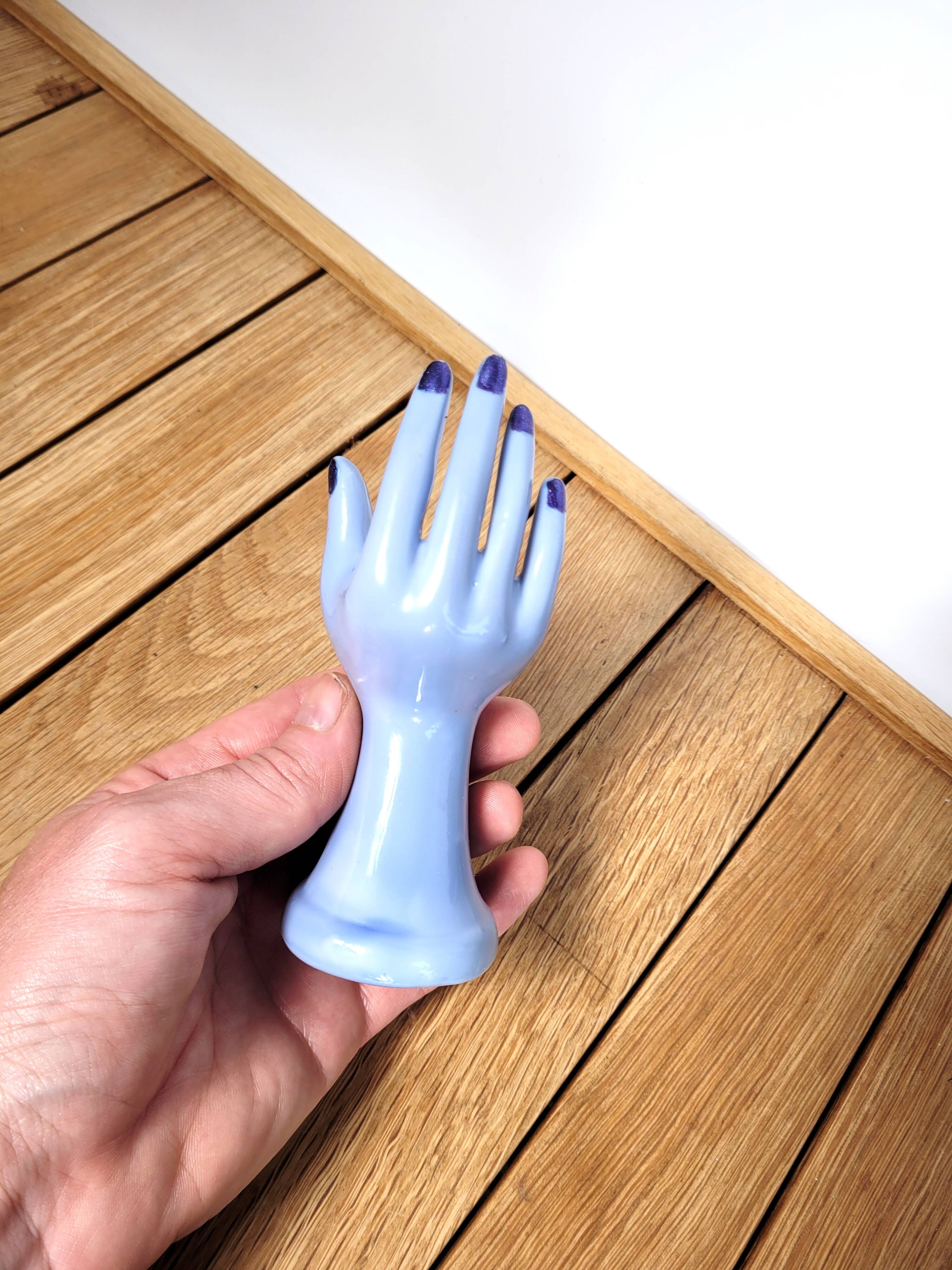 Small vintage ring sizer and purple soliflore