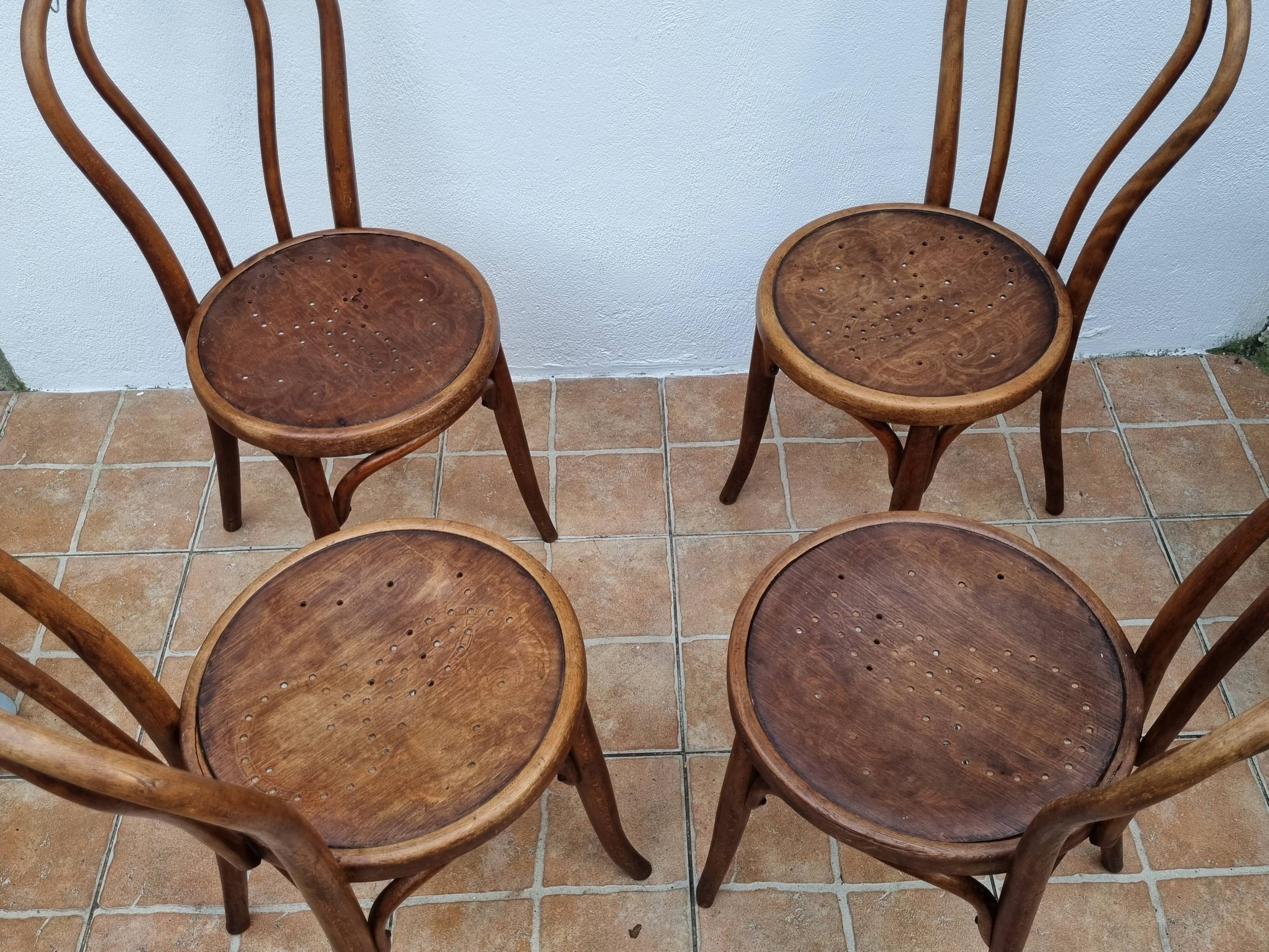 Set of 4 bentwood bistro chairs, stamped "Jacob & Josef Kohn", late 19th century
