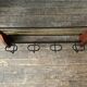 Product BHV Teak and brass coat rack 1960