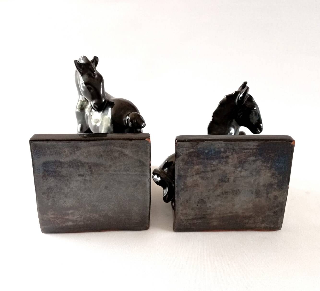 Black ceramic bookends horses