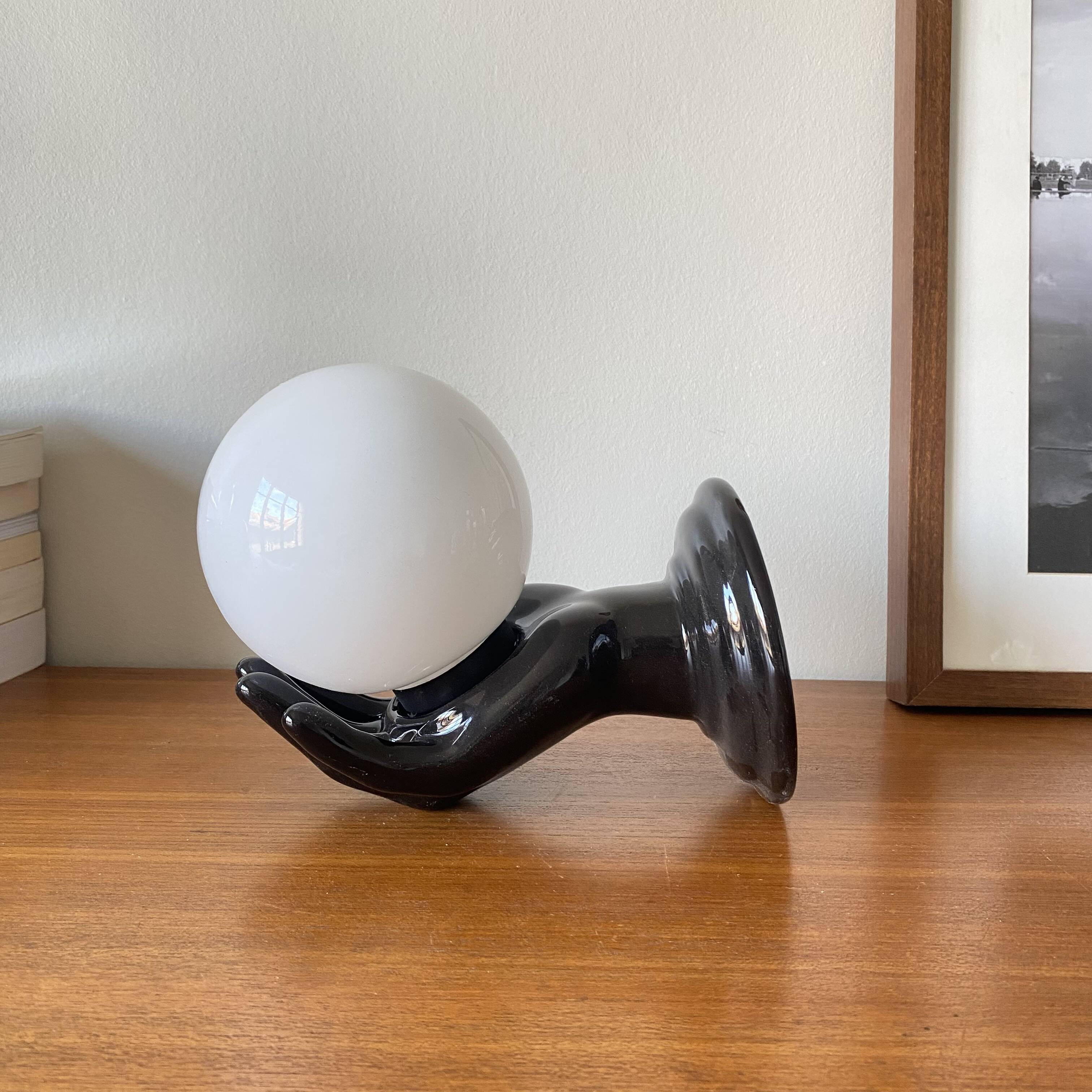 Pair of black ceramic wall lights from the 70s and 80s.