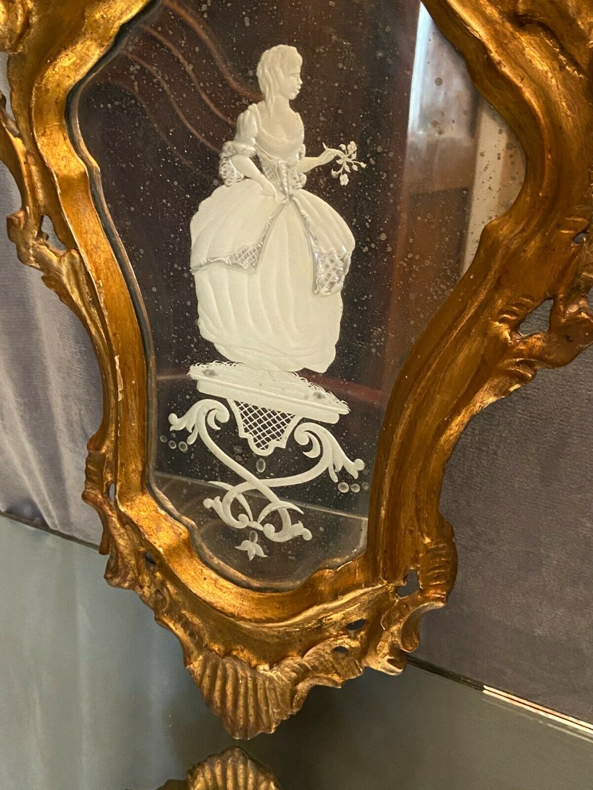 Mirror Rocaille Louis XV gilded wood decorated with a candle display depicting a lady Venice xixth