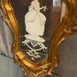 Mirror Rocaille Louis XV gilded wood decorated with a candle display depicting a lady Venice xixth