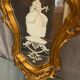 Mirror Rocaille Louis XV gilded wood decorated with a candle display depicting a lady Venice xixth