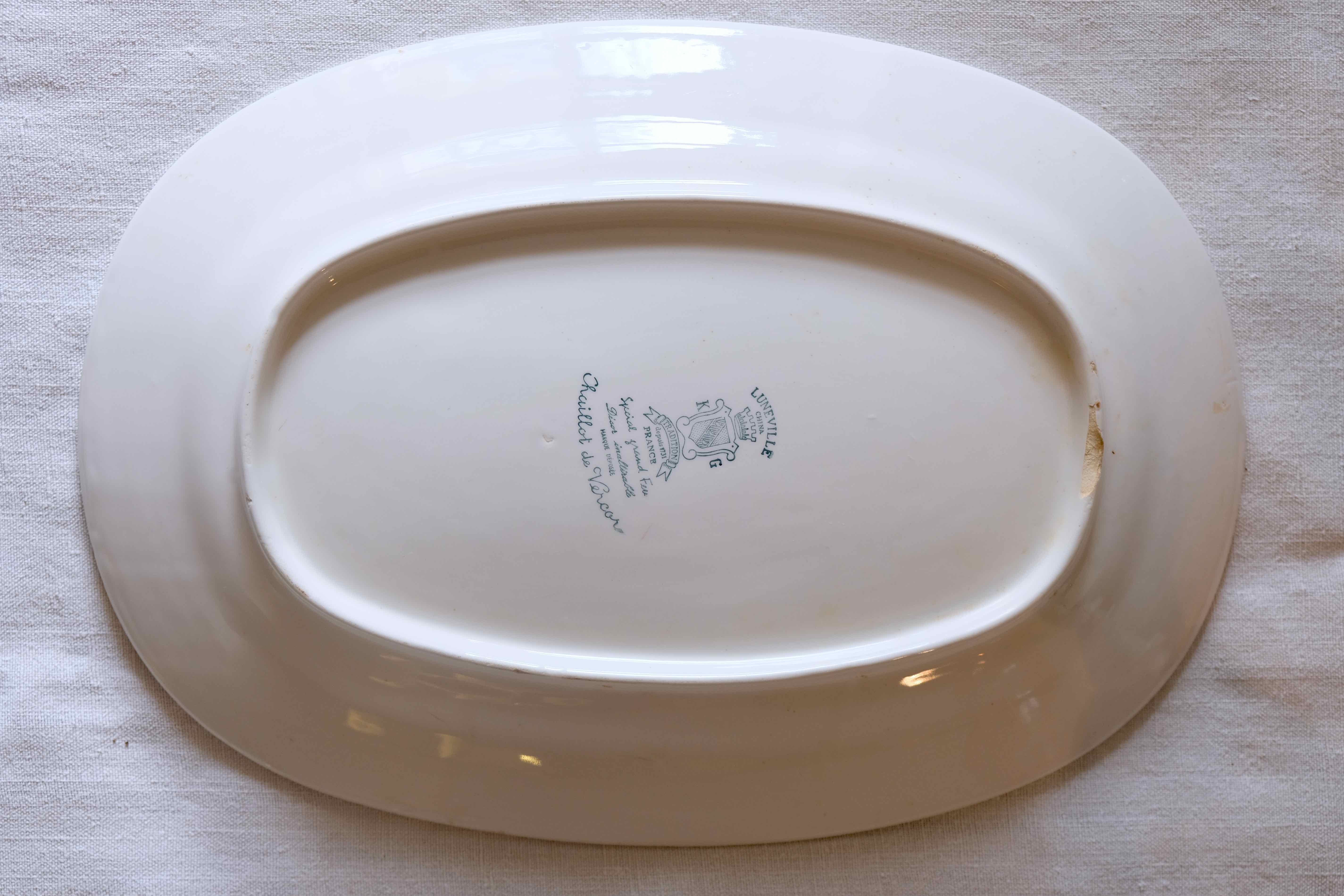 Flat faience of Lunéville China Keller & Guerin 1889 "Chaillot of Vercor" decoration in engraving enhanced drawing flowers