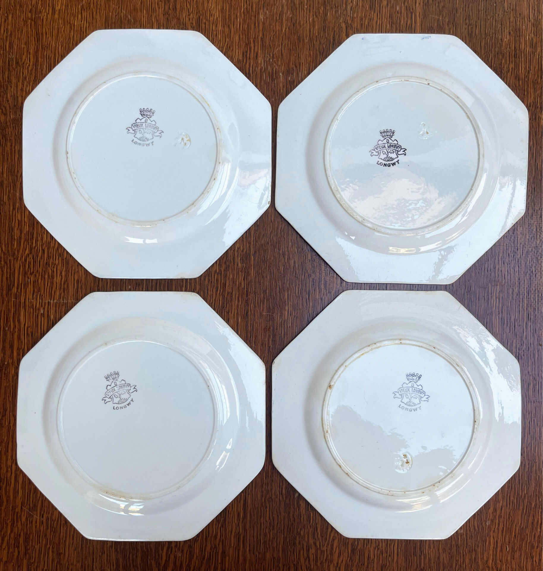 Set of 4 antique Longwy starter or dessert plates.