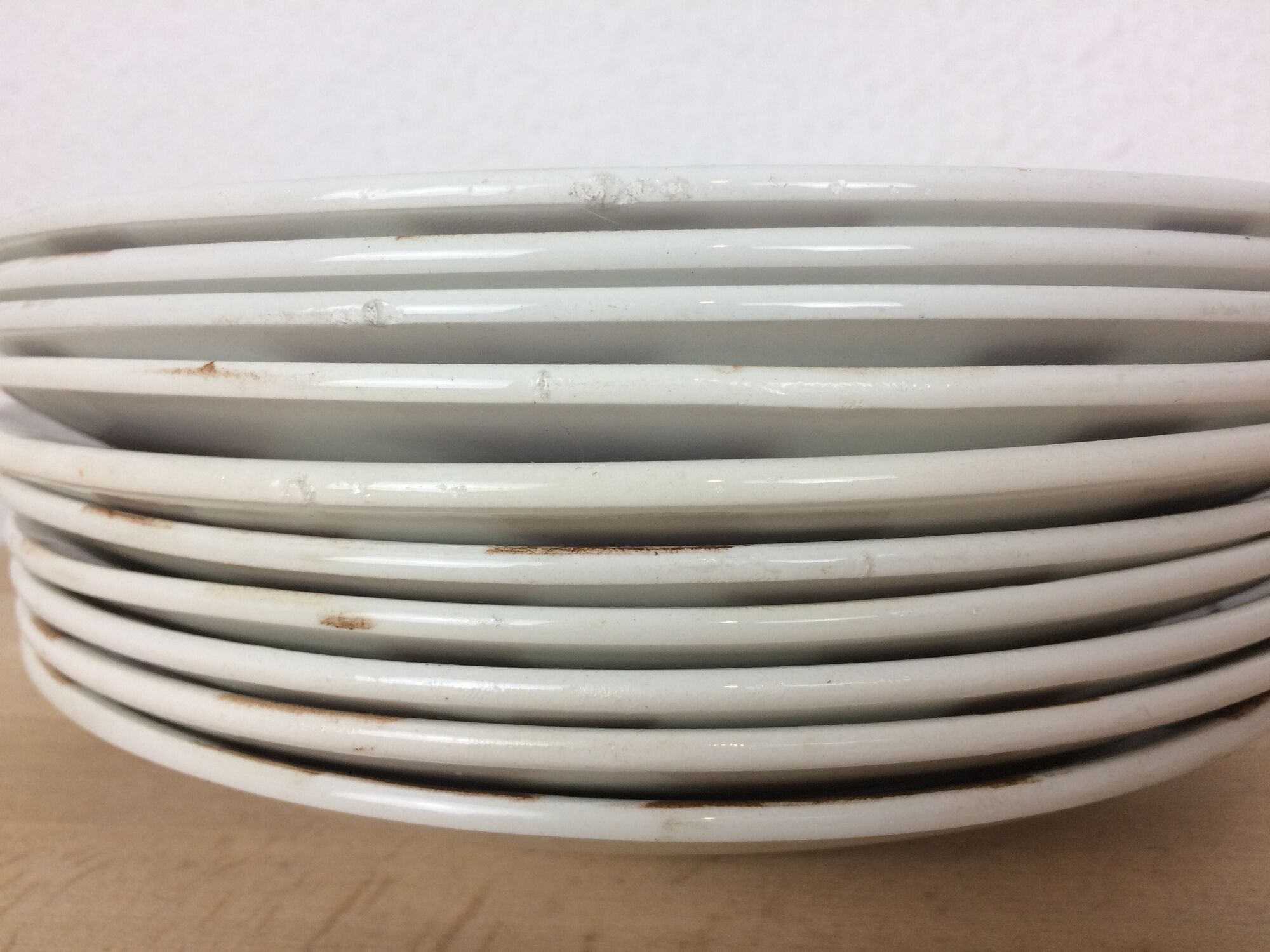 10 ceramic "nappe" plates from the Moulin des Loups, brown