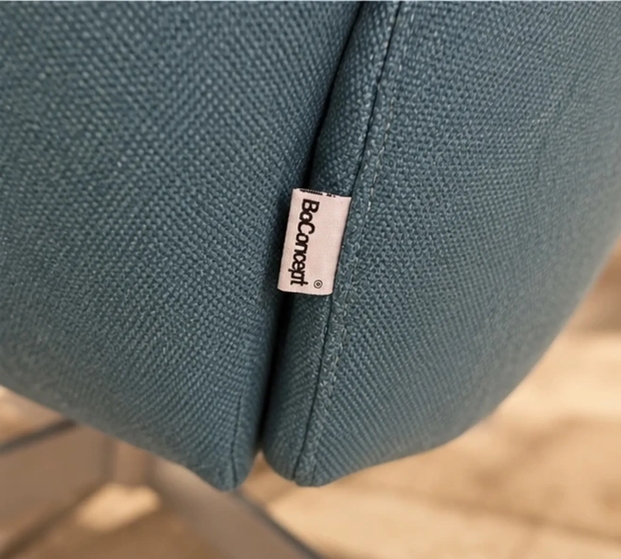 BoConcept design armchair in petrol blue, swivel and reclining.