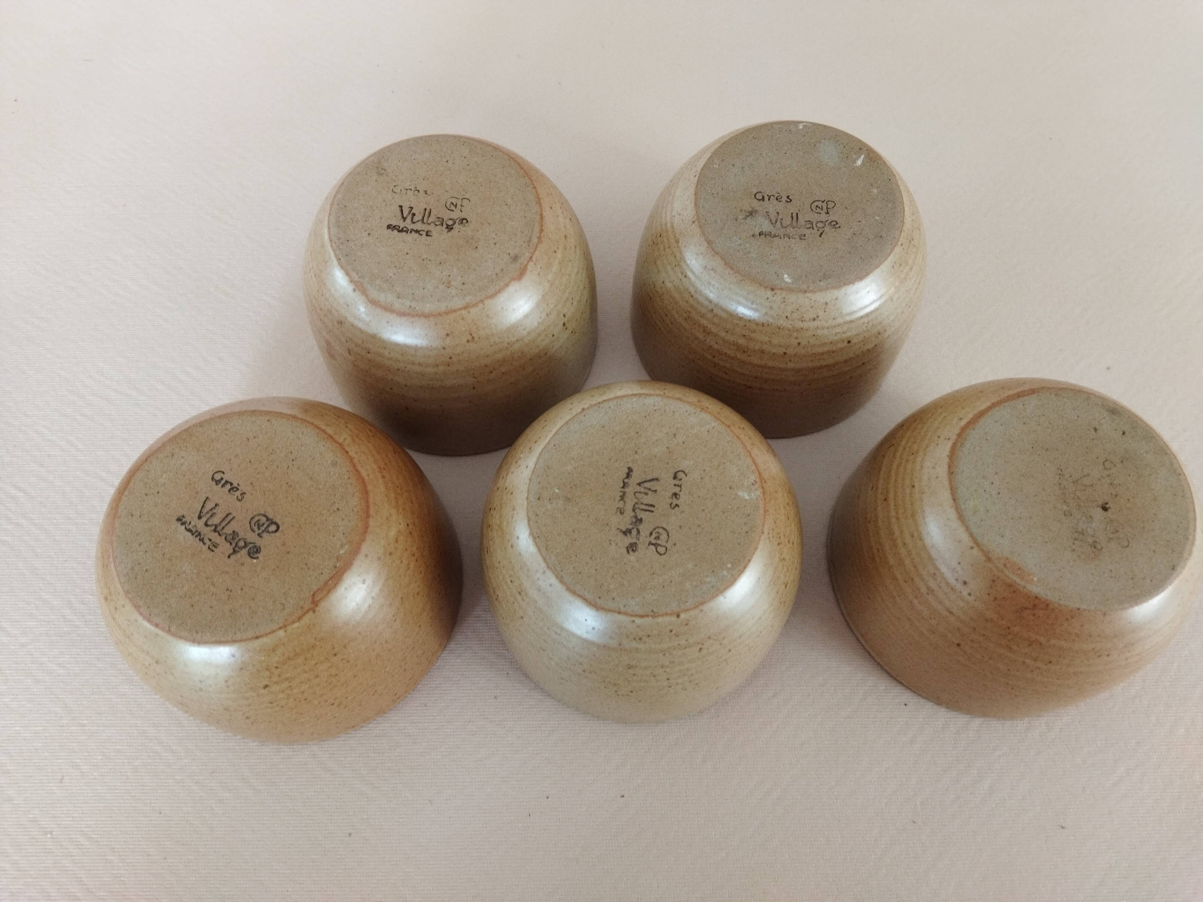 Covered tea bowls in CNP Village sandstone