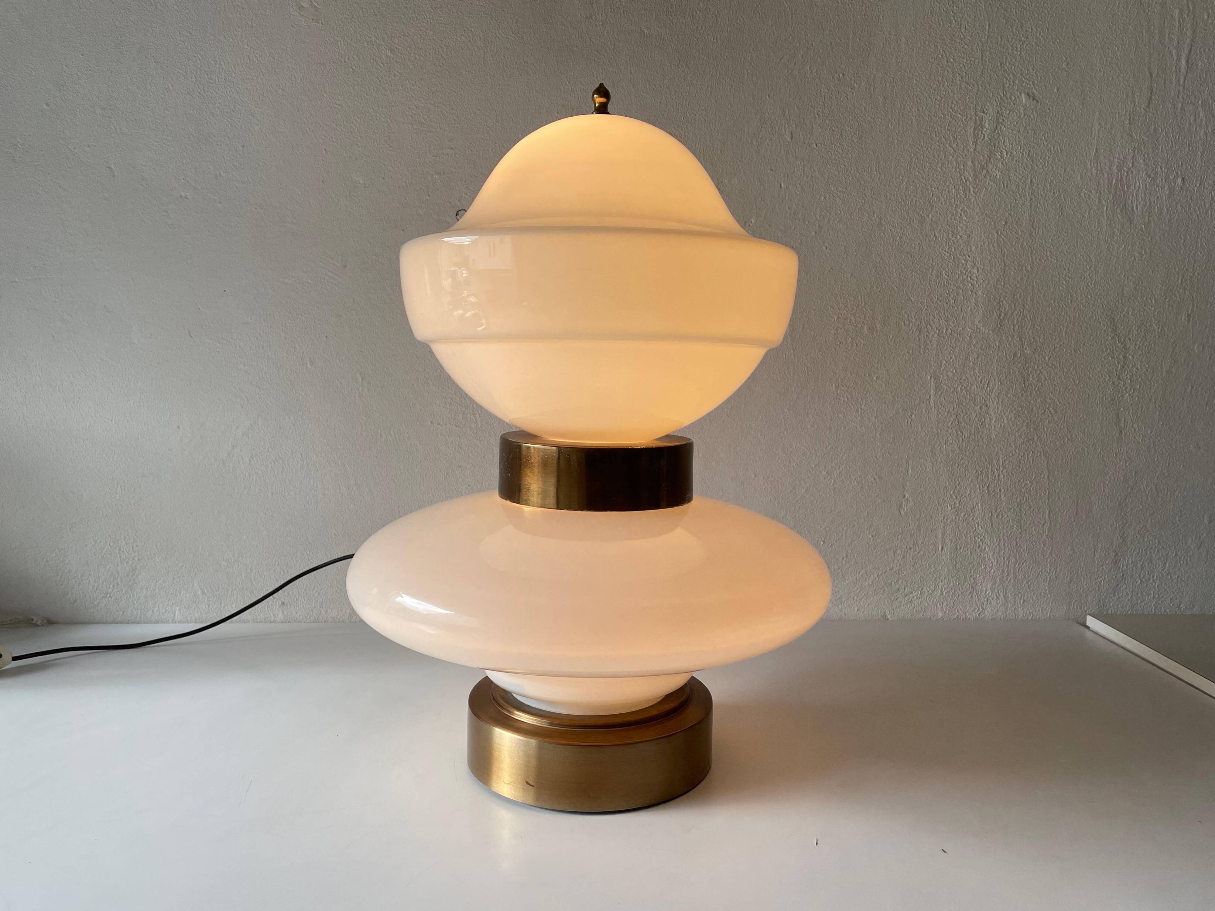 Large table lamp or floor lamp in opal glass and brass body, 1960s, Italy.
