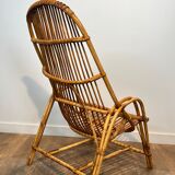 Pair of designer armchairs in rattan