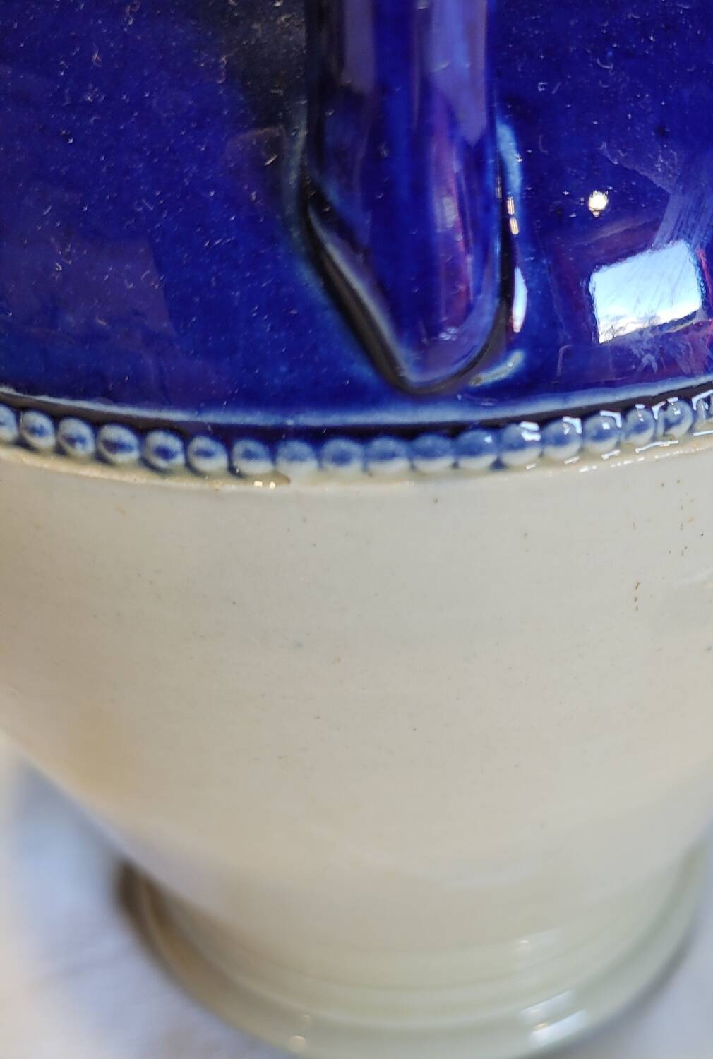 Antique iron-rich earth bottle from Saint Uze, ceramic carafe jug.