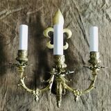 Paire d’appliques fleurs de lys bronze 3 lumières