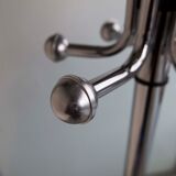 Chrome metal parrot coat holder from the 70s