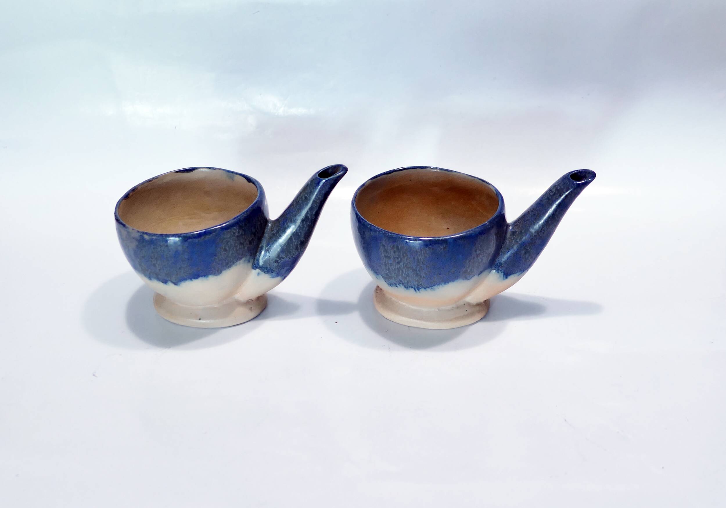 Pair of decorative ceramics in homage to René Magritte 1960-70s
