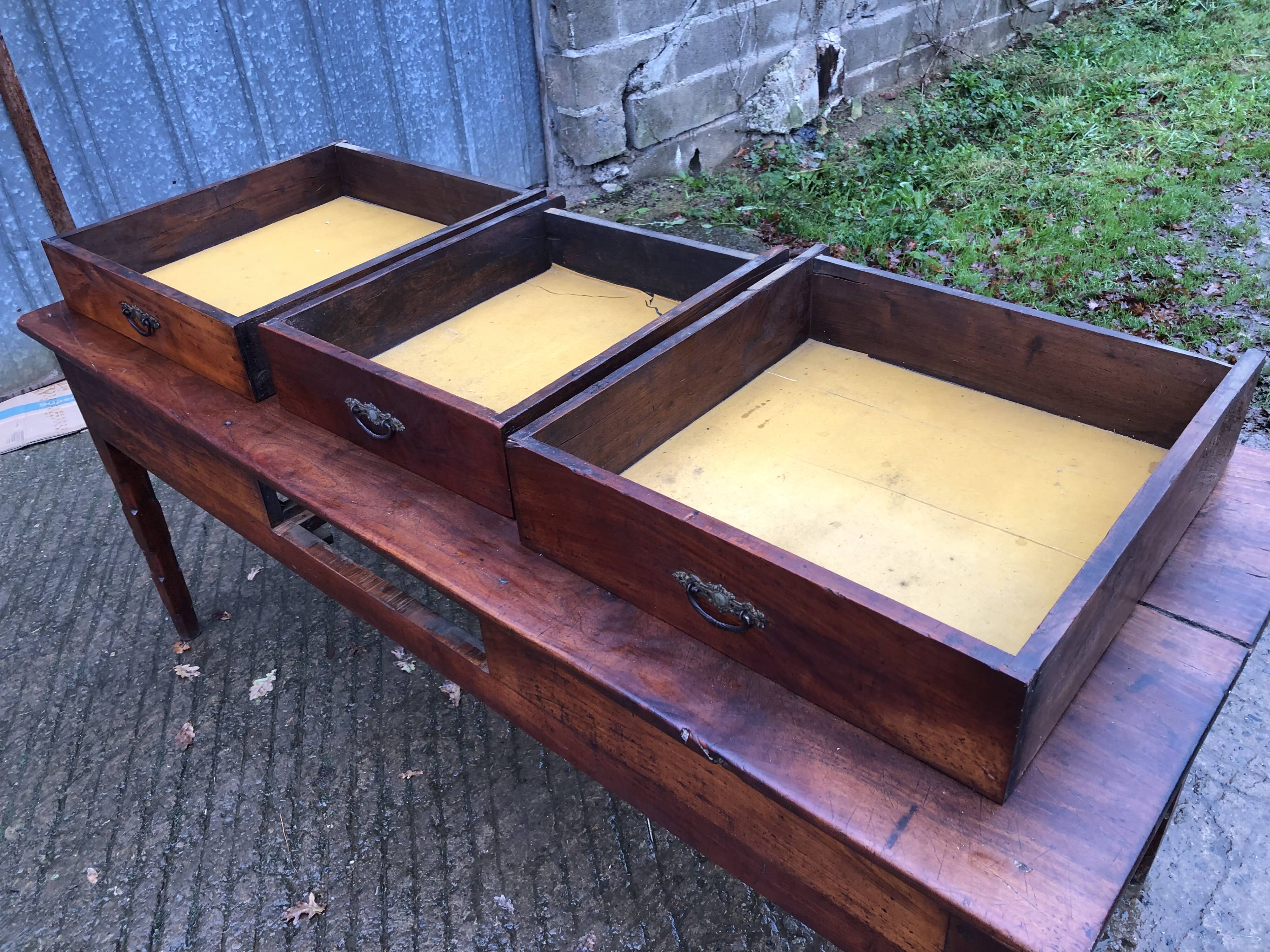 Antique farmhouse table in solid cherry wood with 3 drawers.