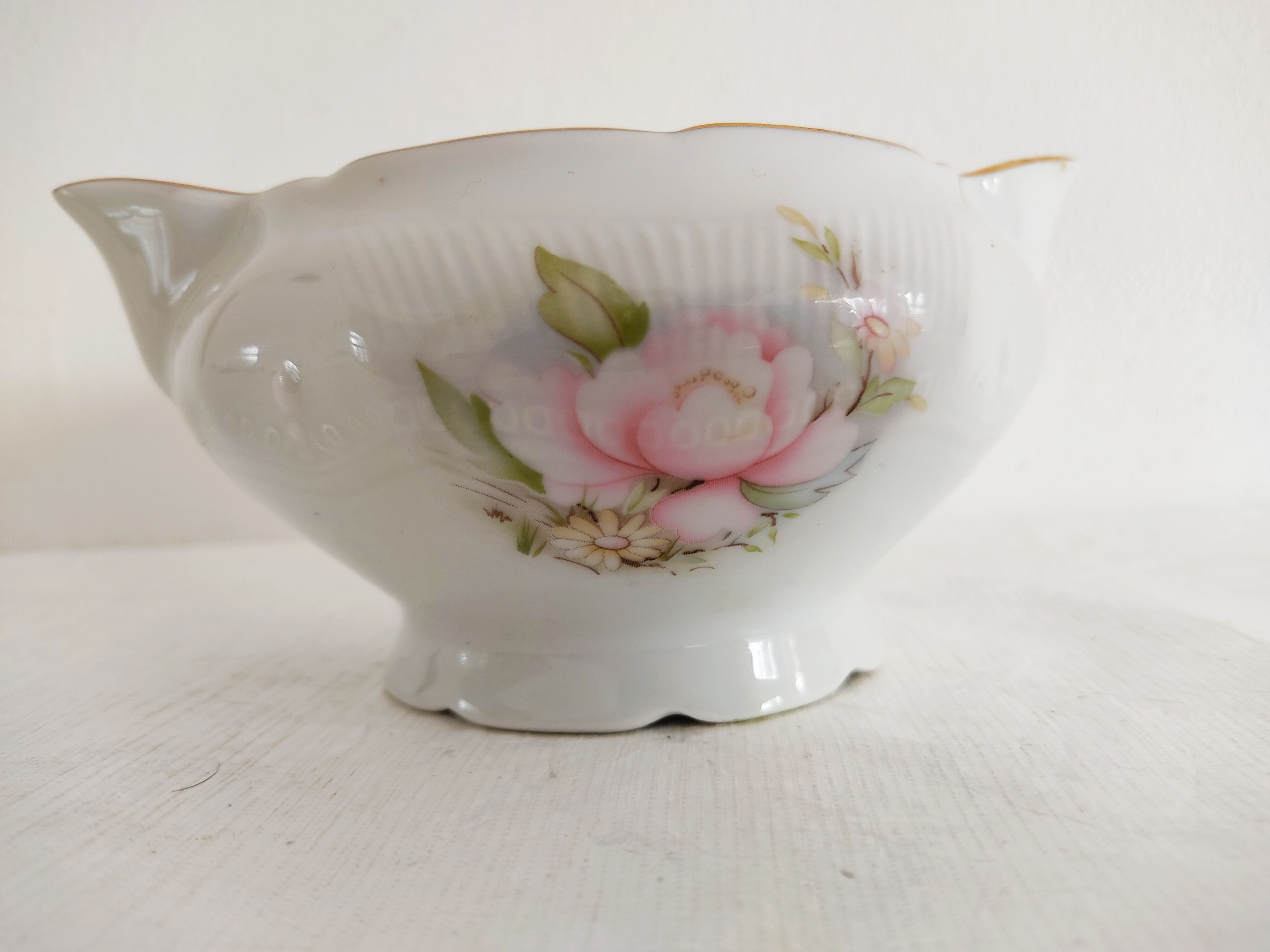 Limoges porcelain saucière decorated with flowers