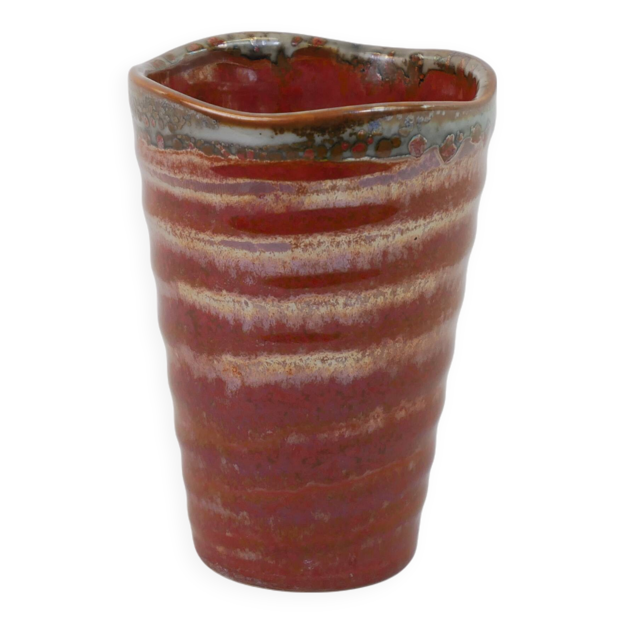 Small orange glazed ceramic cup